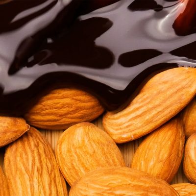 Chocolate Flowing into Almonds